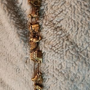 Gold tone bird house bracelet
